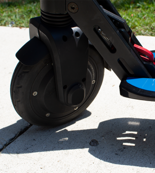 Electric motor is located inside front wheel. There are no exposed wires on this scooter.