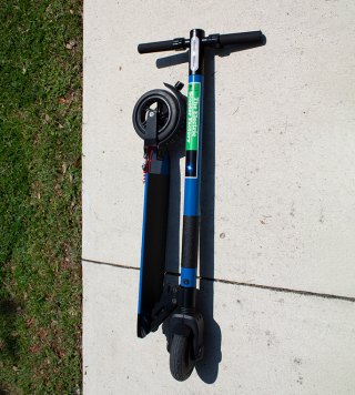 Folded Scooter with grip tape for ease in carrying